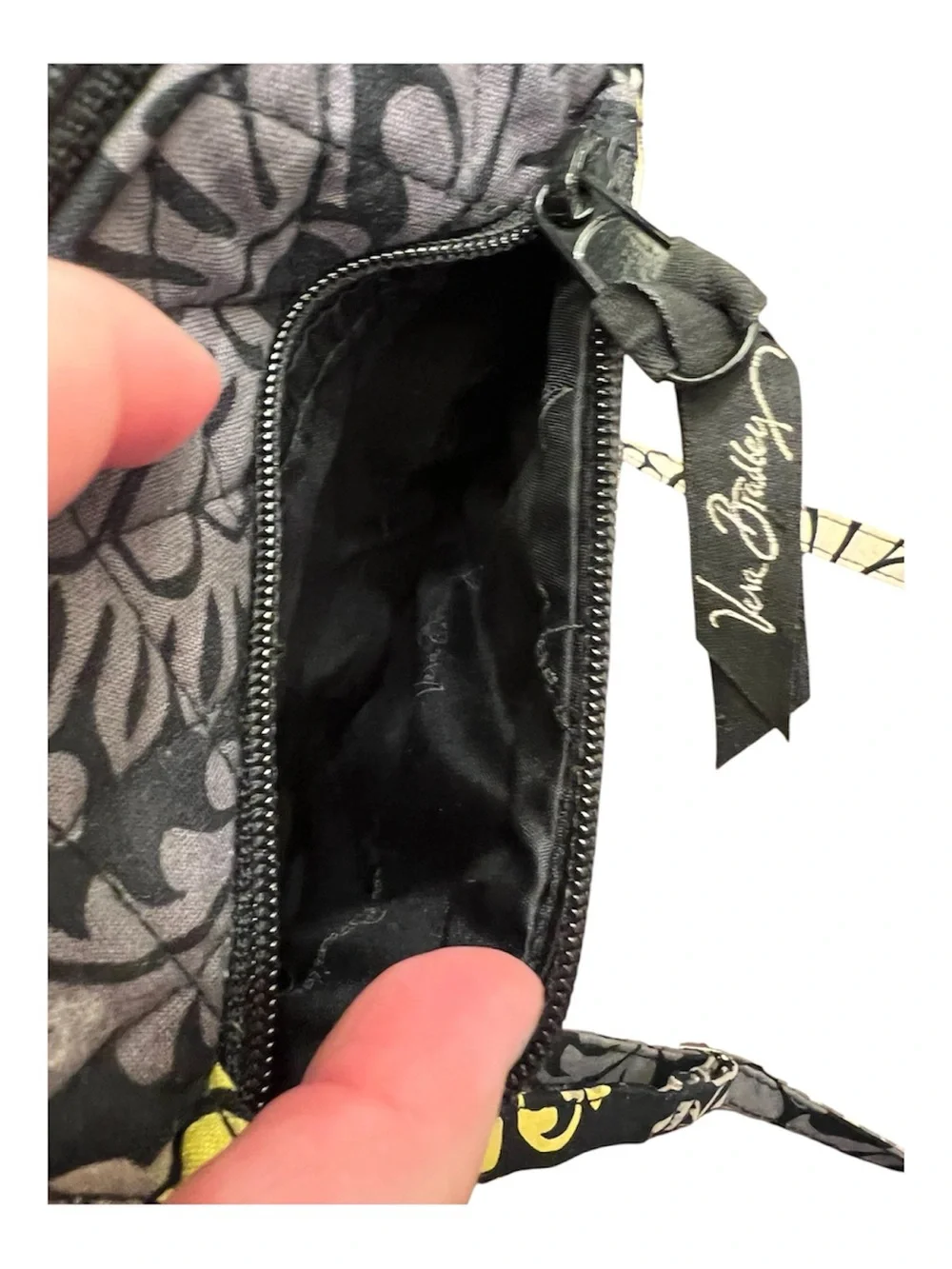 Vera Bradley Mini Hipster Floral Crossbody Bag in Black in “Baroque” pattern.